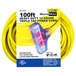 A yellow DuroMax extension cable with blue and red plugs.
