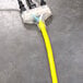 A yellow cable with black wires and a yellow connector.