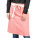 a close-up of a pink apron