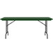 A green rectangular Correll folding table with black legs.