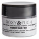 A container of Roxy & Rich Midnight Black petal dust powder.