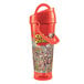 A red plastic Tizzeroo souvenir cup with a handle and straw.