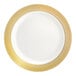 A round bone or ivory plastic plate with a gold lattice design around the rim.