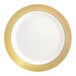 A round bone or ivory plastic plate with a gold lattice design around the rim.