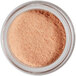 A jar of Roxy & Rich Peach Blush petal dust powder.