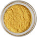 A jar of Roxy & Rich Buttercup Petal Dust containing yellow powder.