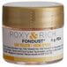 A small container of Roxy & Rich Egg Yellow Fondust powder with a label.