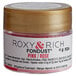 A small container of Roxy & Rich Pink Fondust powder with a label.