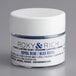 A white container of Roxy & Rich royal blue pigment powder with a white lid.