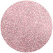 A round of pink and silver glitter.