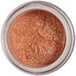 A jar of Roxy & Rich Elegant Rose Gold Sparkle Dust with glittery copper powder.