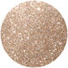 A circle of Roxy & Rich bronze sparkle dust, a round glitter with a gold color.