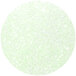 A white circle with green sparkles and white specks.