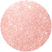 A pink glitter circle with white specks.