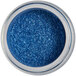 A jar of Roxy & Rich Royal Blue Sparkle Dust on a table.