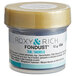 A small jar of Roxy & Rich Teal Fondust food coloring with a label.