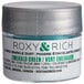 A silver jar of Roxy & Rich Emerald Green Sparkle Dust.