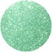 A green glitter circle on a white background.