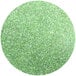 A green circle of Roxy & Rich Super Green Lustre Dust with glitter.