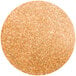 A round orange glitter circle with an orange shimmer.