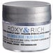 A silver container of Roxy & Rich Colombia Blue Sparkle Dust powder with black text.