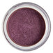 A jar of purple powder with a Roxy & Rich label.
