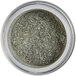 A jar of grey glittery powder with a white label.