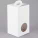 A white circular window candy box.