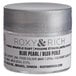 A silver container of Roxy & Rich Blue Pearl Sparkle Dust with a white label.