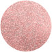 A pink and silver glitter circle with Roxy & Rich Magnolia Lustre Dust.