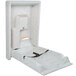 A white plastic Koala Kare baby changing station with a small hole in the top.