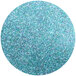 A teal blue glitter circle.