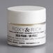 A white Roxy & Rich container of gold pearl lustre dust with a white lid and black text.