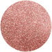 A pink glittery circle of Roxy & Rich Coral Lustre Dust.