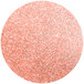 A round pink and silver glittery circle.