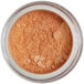 A jar of Roxy & Rich Elegant Rose Gold Lustre Dust powder.