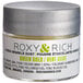 A silver Roxy & Rich container of green gold sparkle dust powder with a white label and lid.