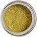 A jar of Roxy & Rich Green Gold Sparkle Dust with golden glitter inside.