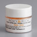 A white Roxy & Rich container of peach lustre dust with a white lid.