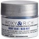 A silver container of Roxy & Rich Night Blue Sparkle Dust with a white label.