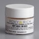 A white jar of Roxy & Rich Soft Gold Lustre Dust with a white lid and black text.