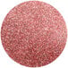 A pink circle with Roxy & Rich Burgundy Lustre Dust inside.