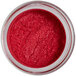 A jar of Roxy & Rich Cranberry Sparkle Dust with red powder inside.