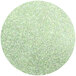 A circle of Roxy & Rich Honeydew Lustre Dust with green glitter.