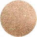 A circle of Roxy & Rich copper luster dust with a pink and gold color.