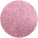 A pink circle with glitter on a white background.