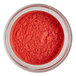 A jar of red-orange Roxy & Rich Lustre Dust powder.