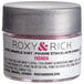 A small container of Roxy & Rich Fuchsia Sparkle Dust with a silver lid.