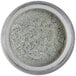 A jar of Roxy & Rich Nu Silver Lustre Dust with silver mineral powder inside.