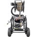 A Simpson pressure washer with a hose attached.